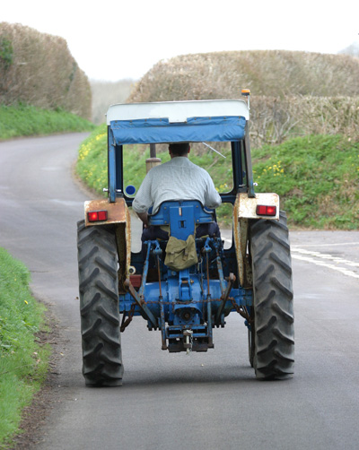 Farm equipment on a rural road