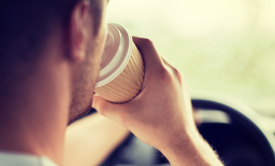Driver with coffee